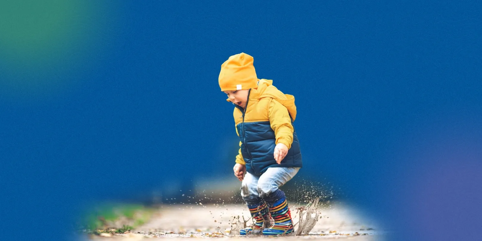 child playing in rain.